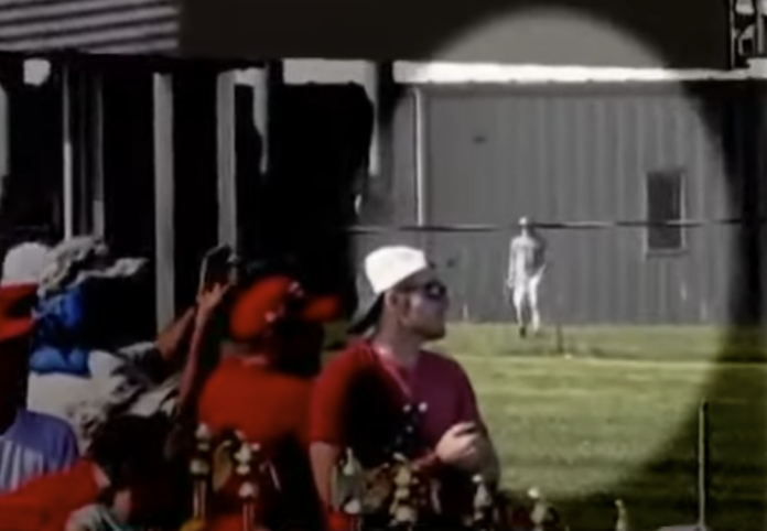 just-in:-chilling-new-video-shows-shooter-‘lurking’-near-rally-stage-before-event