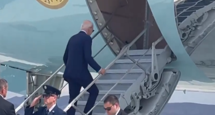 biden-struggles-to-climb-air-force-one-stairs-after-testing-positive-for-covid