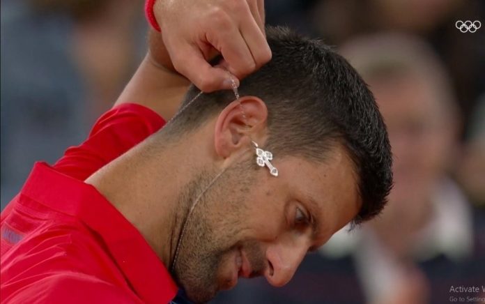 novak-djokovic-wears-christian-cross-at-olympics-after-shocking-last-supper-mockery novak-djokovic-wears-christian-cross-at-olympics-after-shocking-last-supper-mockery