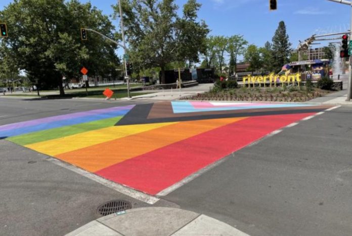 new:-felony-charges-dropped-against-teen-who-drove-scooter-over-pride-themed-crosswalk