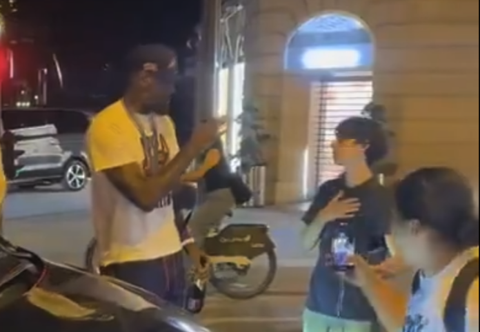 watch:-lebron-james-rudely-snaps-at-kid-in-france-who-asked-for-picture watch:-lebron-james-rudely-snaps-at-kid-in-france-who-asked-for-picture