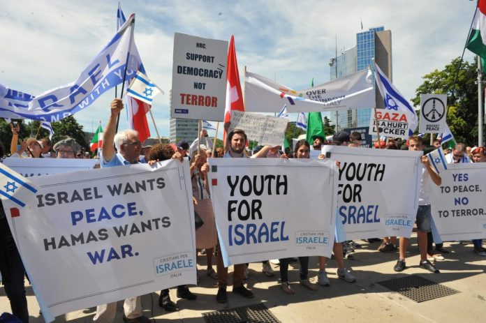 Israel_supporters_protest_in_Geneva_-_19080170080-scaled.jpg