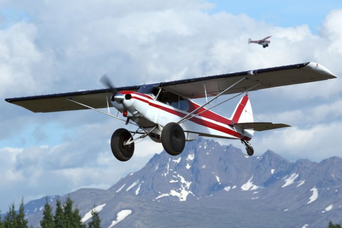 plane-over-alaska.Shutterstock_2164926813.jpg