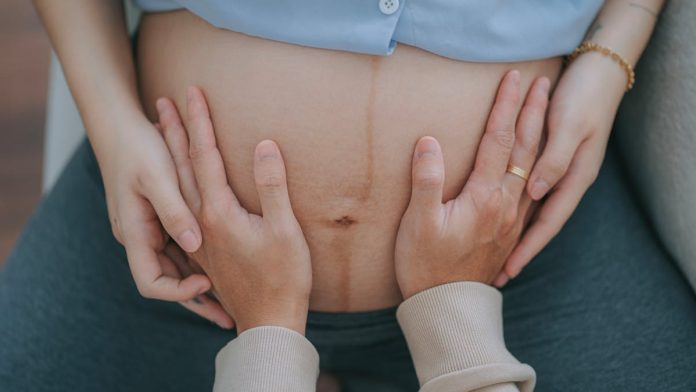 unborn-baby-smiles-the-moment-dad-speaks